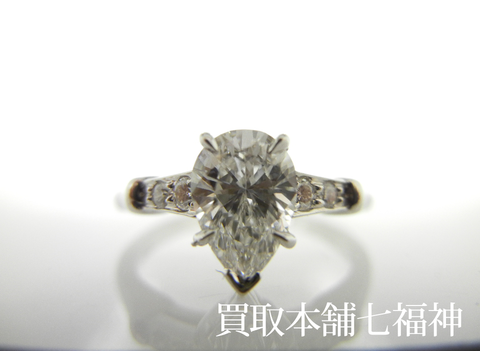 Harry Winston(ハリーウィンストン) Pt950 ペアシェイプ トリストダイヤモンドリング 0.72ct・0.037ctの買取事例