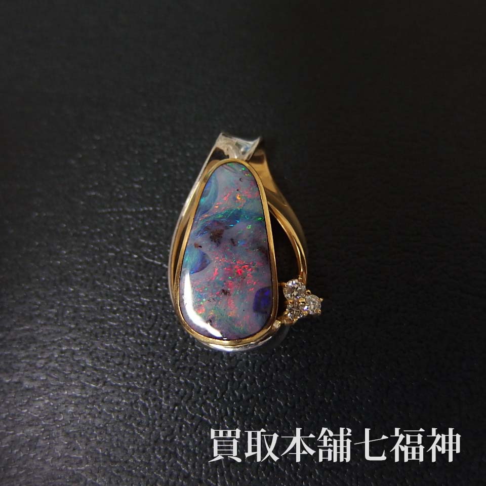 Pt900/K18 7.02ct ボルダーオパールペンダントトップ(メレダイヤ0.19ct付)の買取事例